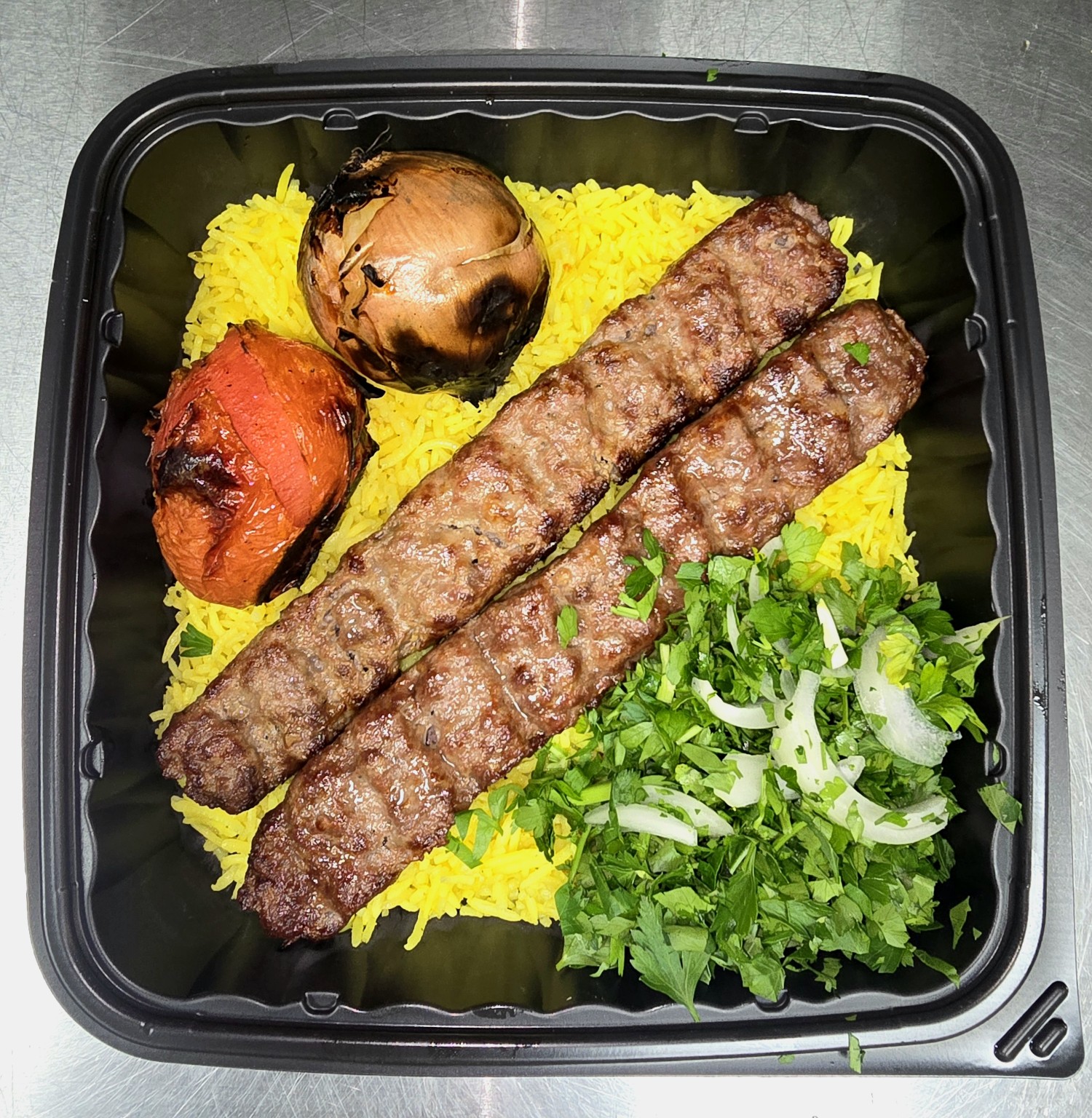 Kabob over rice